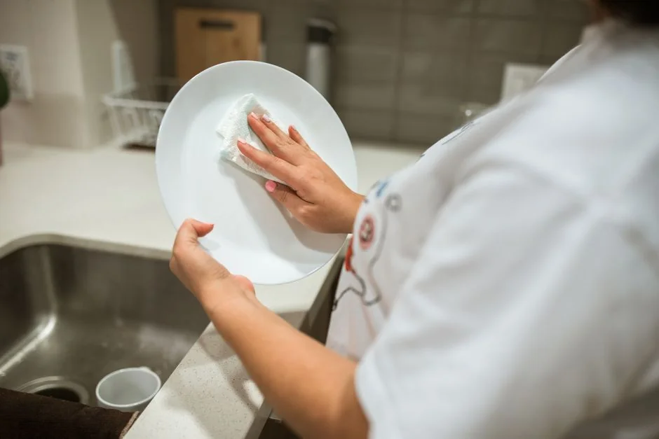 A professional performs sofa cleaning with a grinder in an indoor setting, showcasing efficient service.